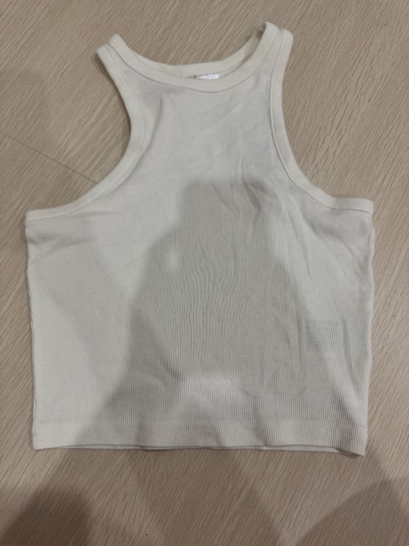Ribbed Racerback Crop Tank Top Cream (Category: Sleeveless) located in Manila. Submitted by nielas.closet (Listing ID 1453332763, Image 1). Description: - Cream ribbed crop tank top - Racerback style - Stretchy material for a comfortable fit - Best fits size Small to Medium - Versatile basic piece, great for layering or wearing alone.