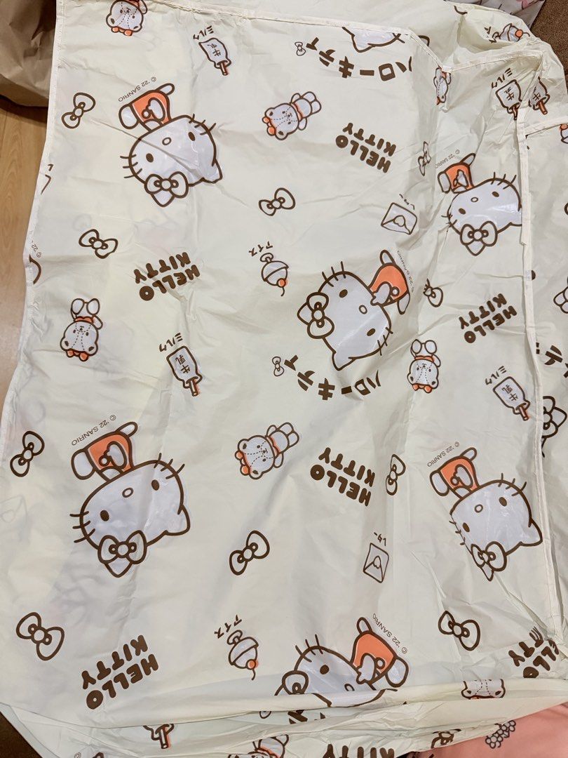 Sanrio Hello Kitty Storage Bag Organizer with zipper (Category: Storage Boxes & Baskets) located in Manila. Submitted by hellokittyjhoe (Listing ID 1453339961, Image 1). Description: - Adorable cream-colored Kitty storage bag. - Features an all-over print of Kitty and friends. - Secure zipper closure at the top. - Ideal for organizing clothes, toys, or other items. - A must-have for any Sanrio or Kitty enthusiast..