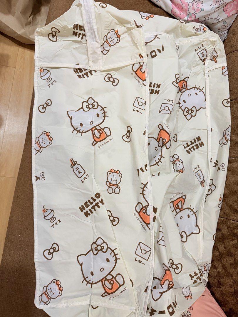 Sanrio Hello Kitty Storage Bag Organizer with zipper (Category: Storage Boxes & Baskets) located in Manila. Submitted by hellokittyjhoe (Listing ID 1453339961, Image 2). Description: - Adorable cream-colored Kitty storage bag. - Features an all-over print of Kitty and friends. - Secure zipper closure at the top. - Ideal for organizing clothes, toys, or other items. - A must-have for any Sanrio or Kitty enthusiast..