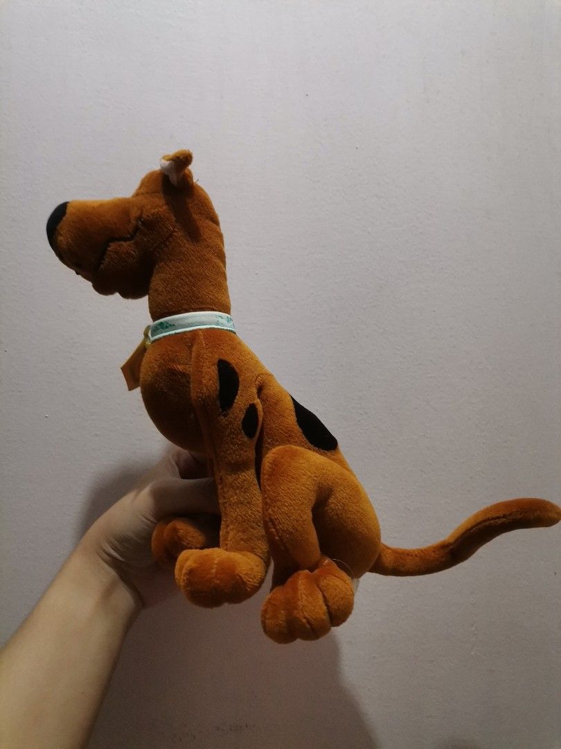 Scooby-Doo Plush Toy (Category: Plushies & Soft Toys) located in Makati City. Submitted by kookybearsstuff (Listing ID 1453334810, Image 3). Description: - Adorable Scooby-Doo plush toy - Features iconic brown fur - Includes his signature blue collar with 'SD' tag - Ideal for Scooby-Doo enthusiasts - Great for decoration or snuggling.