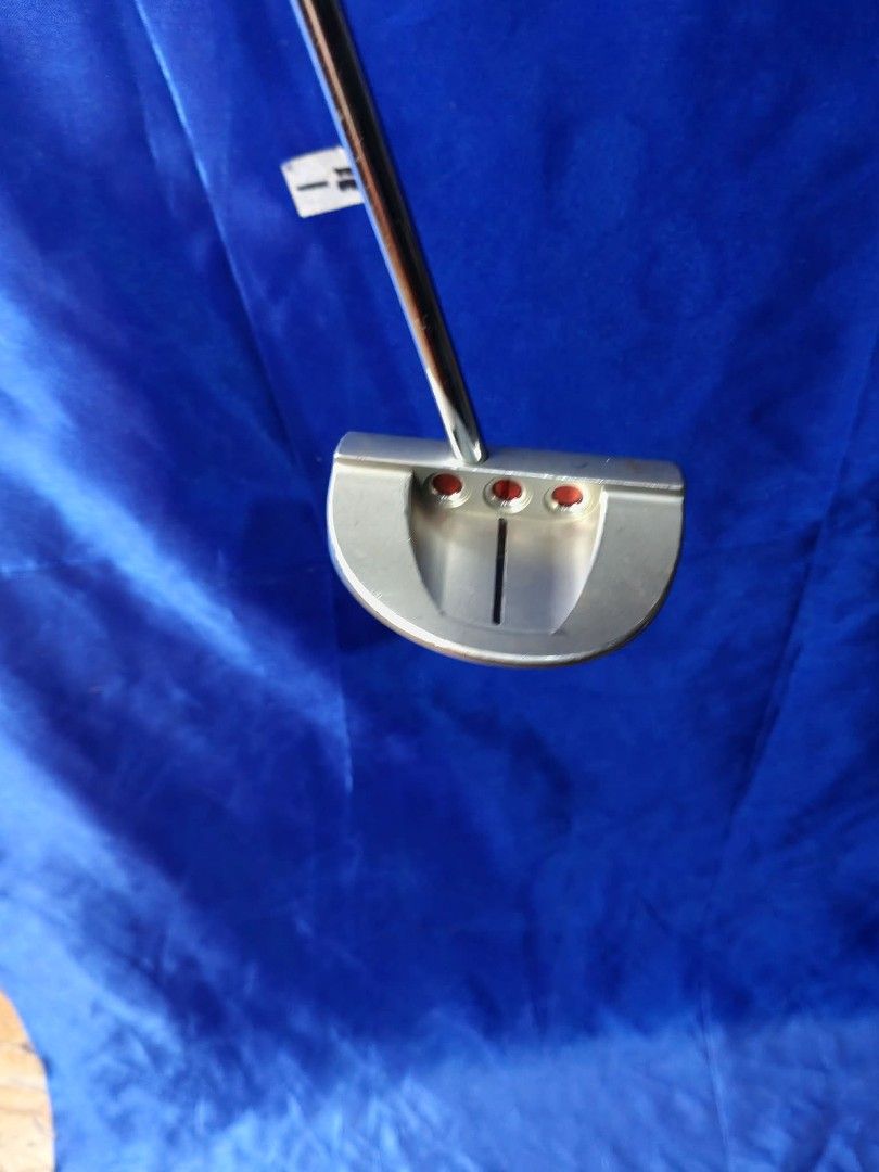 Scotty Cameron Gold S5 Titleist Putter (Category: Golf) located in Manila. Submitted by yeonmei5614747 (Listing ID 1453371330, Image 2). Description: Scotty Cameron GoLo S5 mallet putter, crafted by Titleist and originally released into the premium golf market in 2013-2014. Unisex Putter Right Handed Club 31 inches length - Great feel and balance - Ready for the green - A classic putter for any golfer.