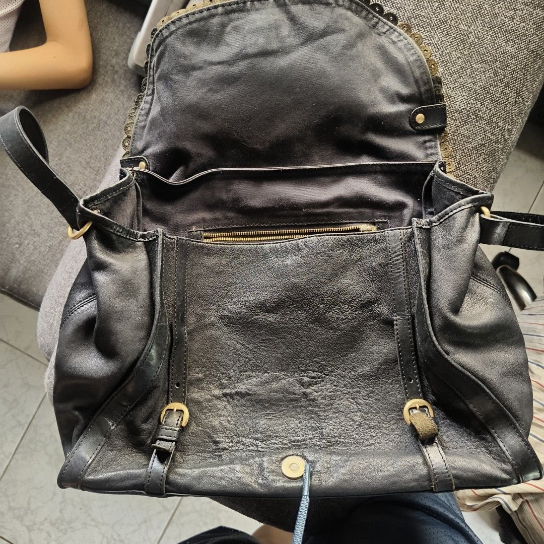 See by Chloé Poya satchel (Category: Luxury Bags & Wallets) located in Manila. Submitted by chonkiethecat (Listing ID 1453240721, Image 2). Description: - See by Chloé black leather shoulder bag - Features a charming scalloped edge detail on the flap - Elegant gold-tone hardware - Spacious main compartment with an interior zip pocket for essentials - Adjustable shoulder strap for comfortable wear - A stylish and practical choice for everyday use.