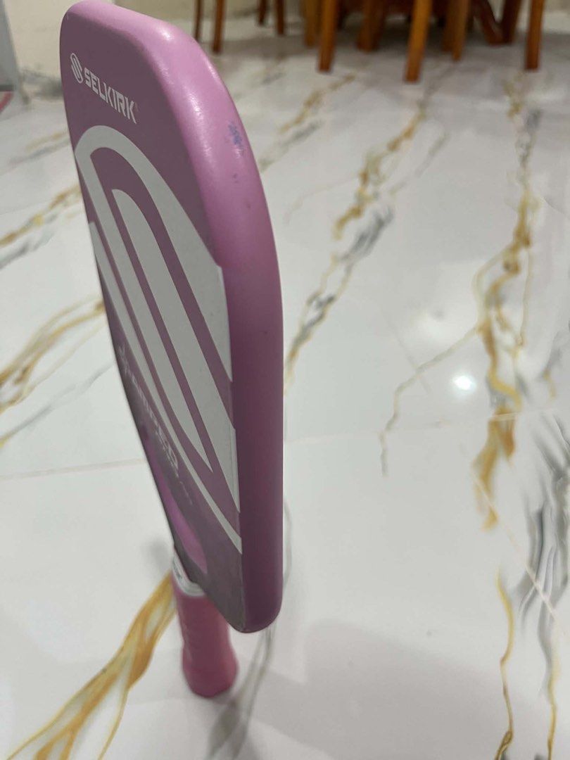 Selkirk Amped Pro Air Pickleball Paddle - Pink (Category: Racket and Ball Sports) located in Pasay City. Submitted by erti121 (Listing ID 1453399092, Image 2). Description: 🤍 P8,000 🤍 Selkirk Amped Pro Air pickleball paddle 🤍 Color: Pink with white accents/light purple 🤍 Shows minor scuffs on the edge from normal use.