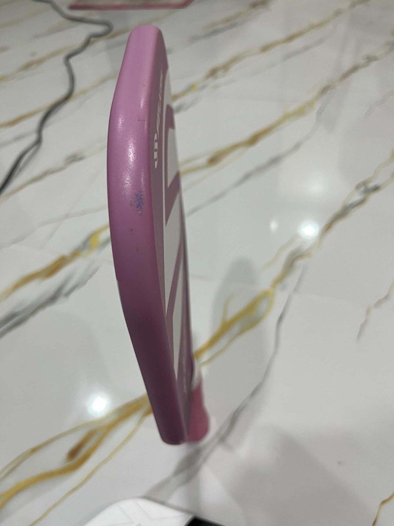 Selkirk Amped Pro Air Pickleball Paddle - Pink (Category: Racket and Ball Sports) located in Pasay City. Submitted by erti121 (Listing ID 1453399092, Image 3). Description: 🤍 P8,000 🤍 Selkirk Amped Pro Air pickleball paddle 🤍 Color: Pink with white accents/light purple 🤍 Shows minor scuffs on the edge from normal use.