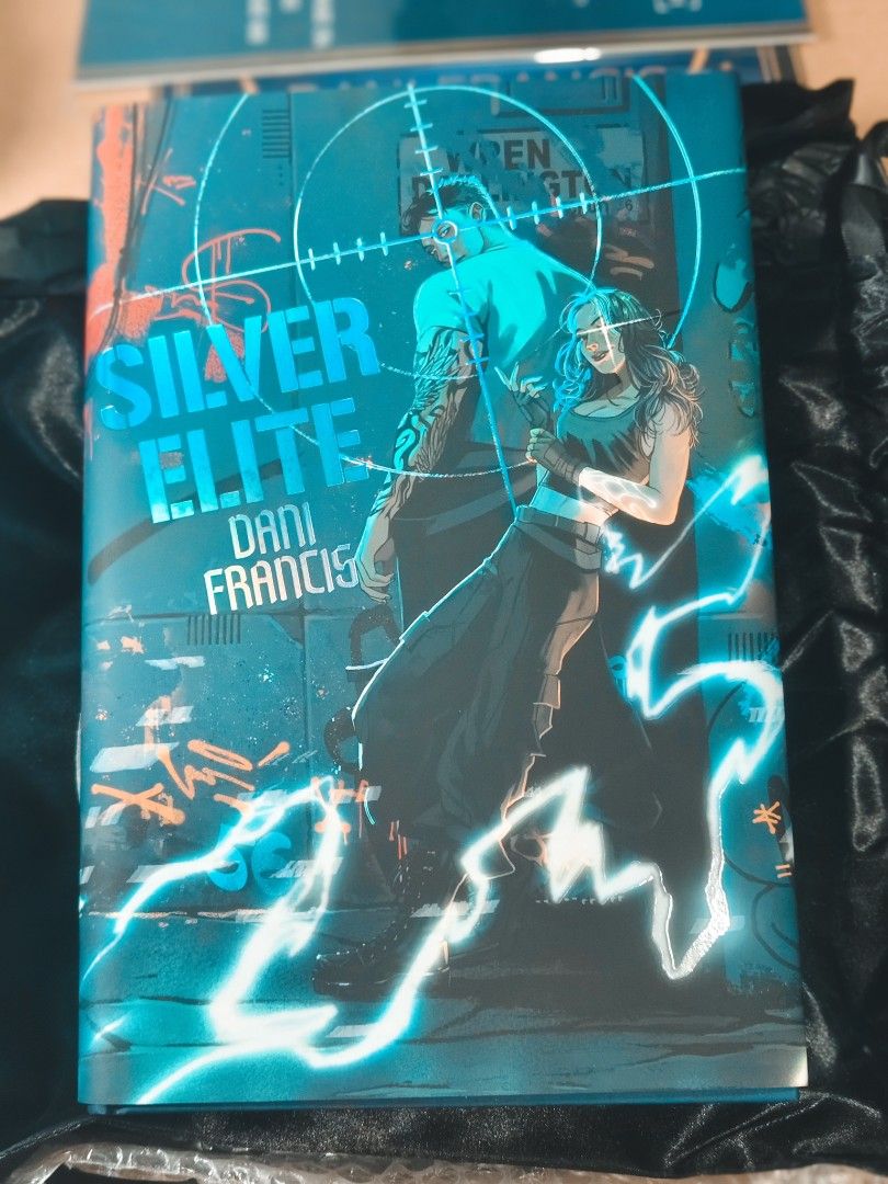 Silver Elite Dreamerwhale Exclusive Edition Book Set (Category: Storybooks) located in Baguio. Submitted by selover1492 (Listing ID 1453365446, Image 2). Description: - Exclusive Silver Elite Dreamerwhale Edition book - Includes black drawstring bag - Features overlay set with illustrations by @sad_knight_art - Edgy design with graffiti and wolf - Ideal for collectors.