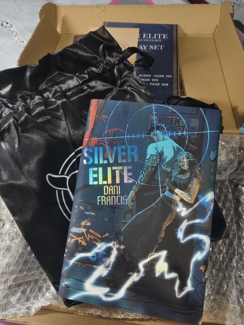 Silver Elite Dreamerwhale Exclusive Edition Book Set (Category: Storybooks) located in Baguio. Submitted by selover1492 (Listing ID 1453365446, Image 1). Description: - Exclusive Silver Elite Dreamerwhale Edition book - Includes black drawstring bag - Features overlay set with illustrations by @sad_knight_art - Edgy design with graffiti and wolf - Ideal for collectors.