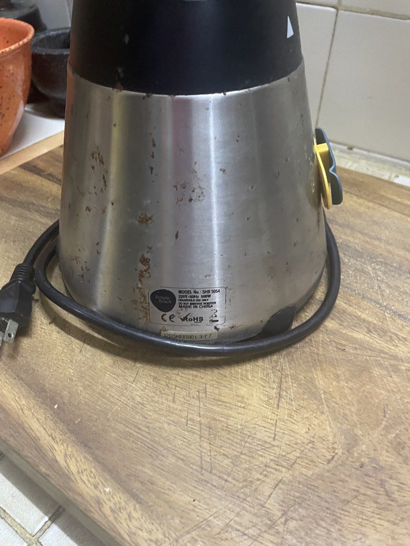 Simple Touch Blender 3HB 3054 (Category: Juicers, Blenders & Grinders) located in Quezon City. Submitted by deadmit (Listing ID 1453240422, Image 3). Description: - Simple Touch blender for sale - Features multiple speed settings (OFF, Switch, Pulse, 1/6, 2/7, 3/8, 4/9, 5/10) - Durable glass jar with black lid - Sleek silver base - Convenient cord storage wrapped around the base - Shows some signs of wear on the base, consistent with normal use.