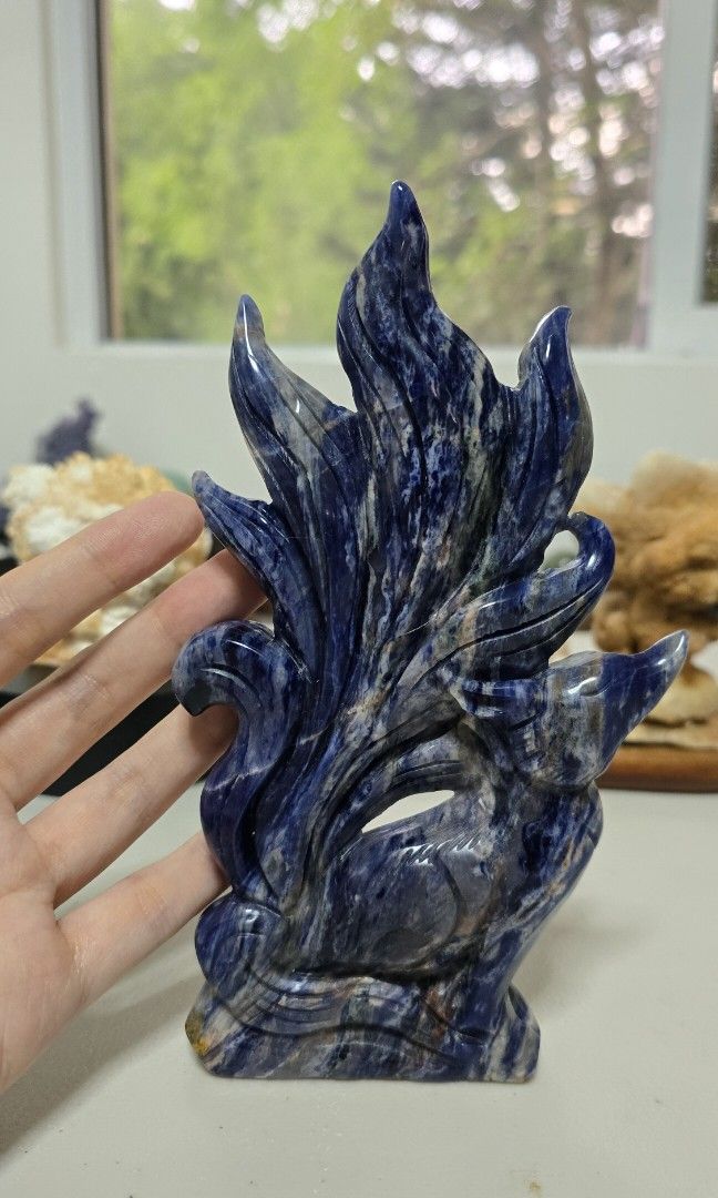 Sodalite Nine Tailed Fox Carving (Category: Precious Stones) located in Taguig. Submitted by c_rivera (Listing ID 1453371347, Image 3). Description: sodalite benefits: Mental clarity: Clears confusion and helps focus the mind on truth and logic. Stress relief: Calms panic attacks, releases anxiety, and quiets a racing mind. Boosts confidence: Strengthens self-esteem and encourages you to trust your own instincts. Calming workspaces: Placed on a d