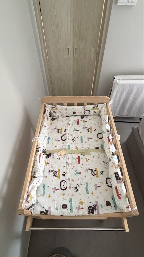 Solid Wood Changing Table (Category: Changing Tables & Stations) located in Singapore. Submitted by _lessismore (Listing ID 1453308041, Image 2). Description: Simple changing table with pad. perfect height, stable countertop, soft odorless pad, large easy-access storage for diapers and wipes, plus a towel bar. Lucky Baby rubber sheet fits the table perfectly (not included)..
