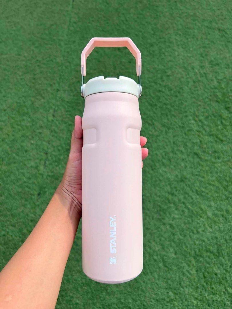 Stanley Water Bottle with Handle - Various Colors (Category: Water Bottles & Tumblers) located in Manila. Submitted by keithramos.com (Listing ID 1453418487, Image 1). Description: - Stanley water bottle - Features a convenient carrying handle - Available colors: pink, blue, white, coral, black - Keeps drinks cold or hot for hours - Perfect for everyday use and outdoor adventures - Durable and stylish design.