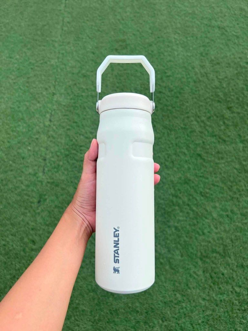 Stanley Water Bottle with Handle - Various Colors (Category: Water Bottles & Tumblers) located in Manila. Submitted by keithramos.com (Listing ID 1453418487, Image 3). Description: - Stanley water bottle - Features a convenient carrying handle - Available colors: pink, blue, white, coral, black - Keeps drinks cold or hot for hours - Perfect for everyday use and outdoor adventures - Durable and stylish design.