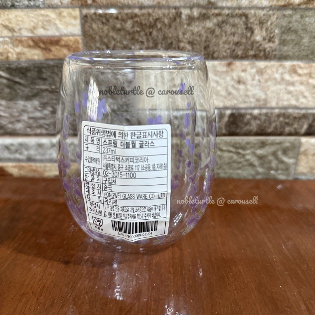 Starbucks Double Wall Glass Mug Lavender (Category: Coffee & Tea Tableware) located in Santo Tomas. Submitted by nobleturtle_e41485 (Listing ID 1453263243, Image 3). Description: - Features a lovely lavender floral design - From Starbucks Korea - Capacity: 237ml - Easy to hold - Tag Intact.