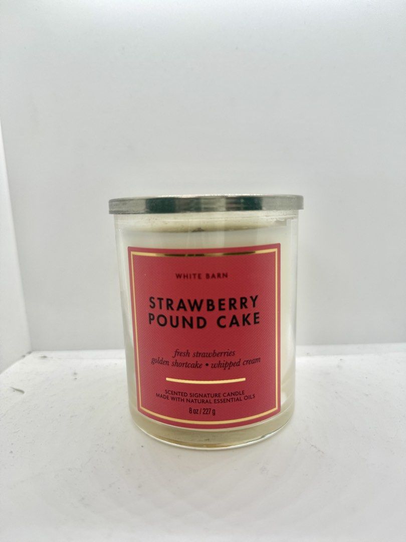 Strawberry Pound Cake Scented Candle (Category: Home Fragrance) located in Mandaluyong City. Submitted by cherryspicks (Listing ID 1453385732, Image 2). Description: Bath and BodyWorks Single Wick Scented Candle. Used once with a heating lamp. Smells of sweet strawberry, shortcake, and whipped cream. Yumm! The lid has discolored a bit. No box. .
