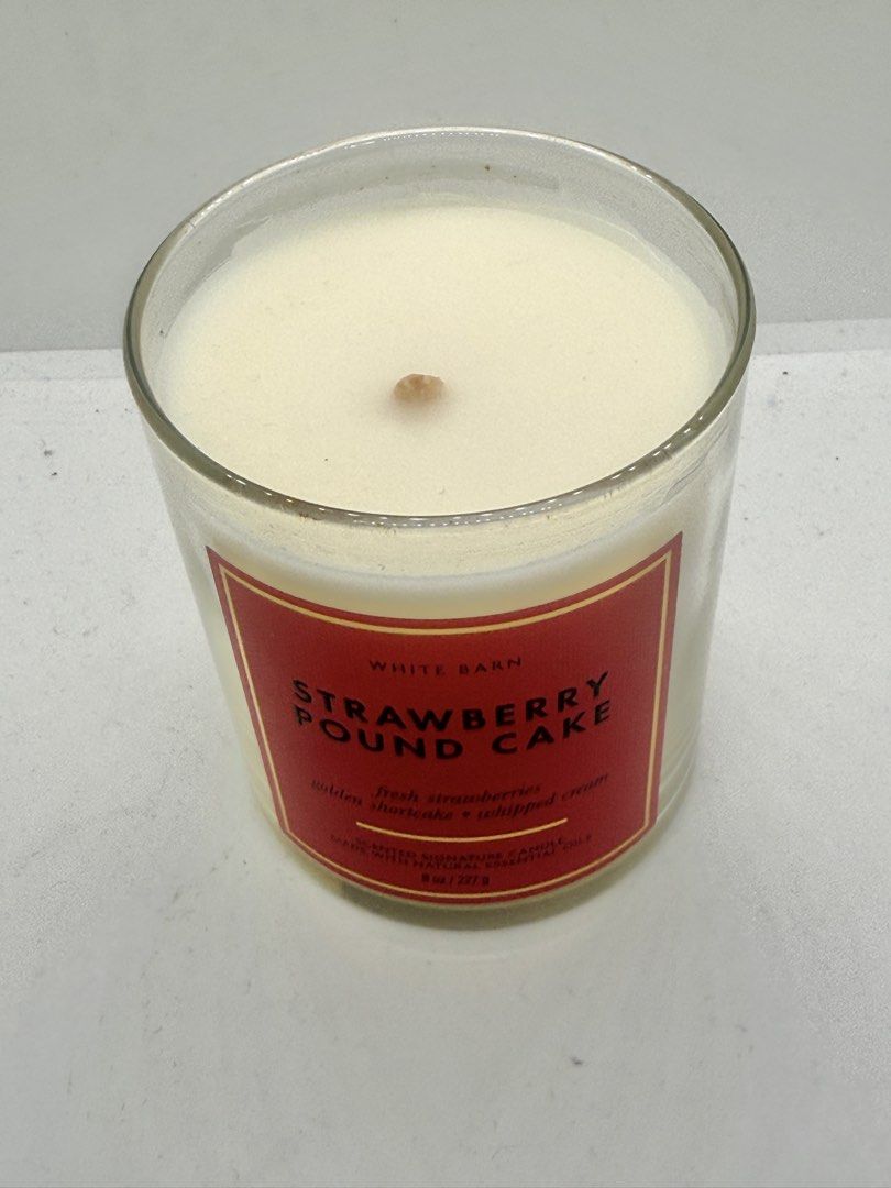 Strawberry Pound Cake Scented Candle (Category: Home Fragrance) located in Mandaluyong City. Submitted by cherryspicks (Listing ID 1453385732, Image 3). Description: Bath and BodyWorks Single Wick Scented Candle. Used once with a heating lamp. Smells of sweet strawberry, shortcake, and whipped cream. Yumm! The lid has discolored a bit. No box. .
