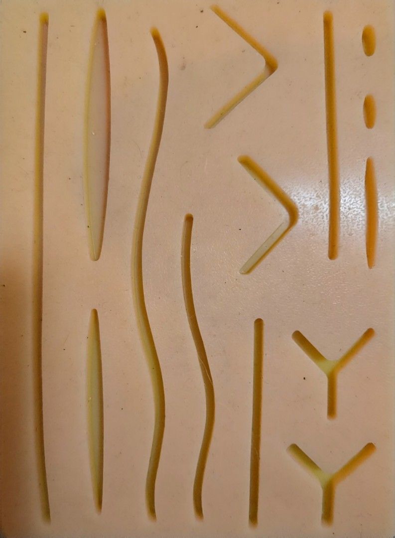 Surgical Suture Practice Pad for Medical Training (Category: Medical Supplies & Tools) located in Caloocan City. Submitted by mluck (Listing ID 1453427428, Image 2). Description: - Silicone suture practice pad with various cuts and shapes - Ideal for learning and practicing different suturing techniques - Durable and reusable material - Comes in a convenient pink case - Perfect for medical students and aspiring healthcare professionals.