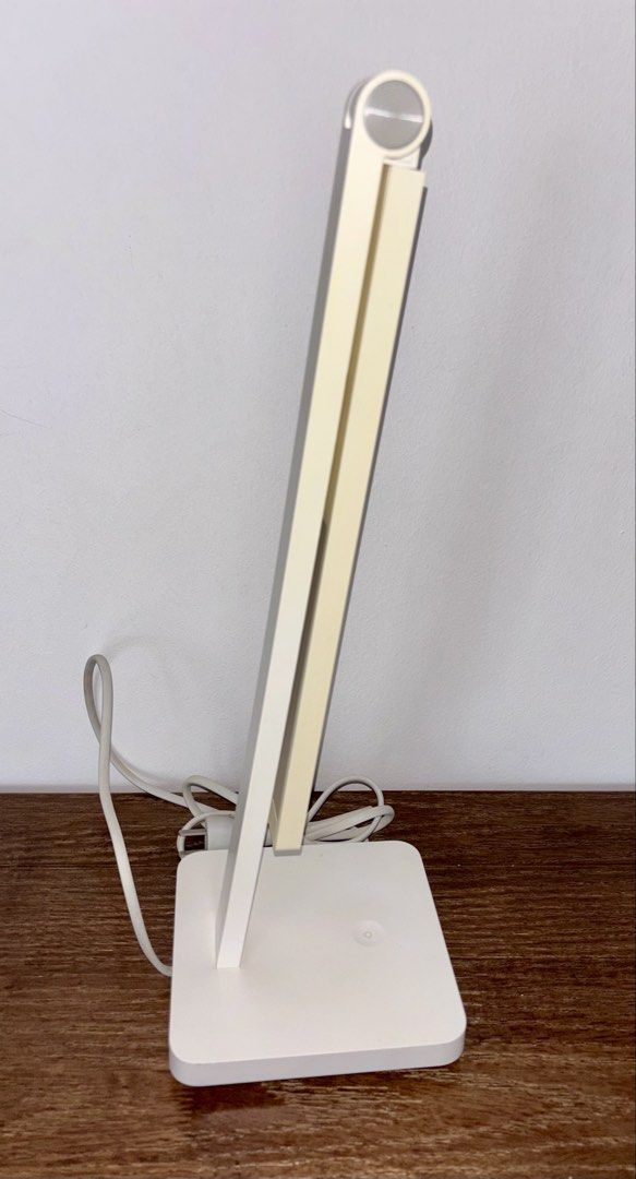 table light (Category: Lighting) located in Singapore. Submitted by liuxue3918 (Listing ID 1453332461, Image 3). Description: - Sleek, modern white desk lamp - Adjustable arm for customizable light direction - Minimalist and clean design - Ideal for study, work, or bedside use - Enhances any workspace with its contemporary aesthetic.