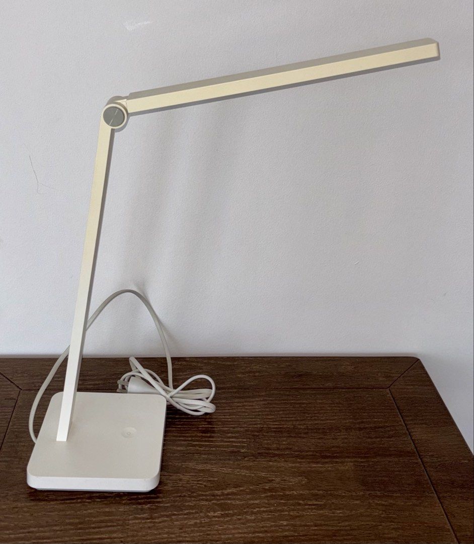 table light (Category: Lighting) located in Singapore. Submitted by liuxue3918 (Listing ID 1453332461, Image 1). Description: - Sleek, modern white desk lamp - Adjustable arm for customizable light direction - Minimalist and clean design - Ideal for study, work, or bedside use - Enhances any workspace with its contemporary aesthetic.