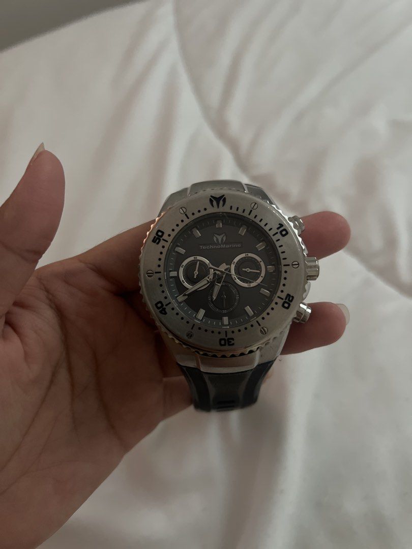 TechnoMarine Chronograph Stainless Steel Watch (Category: Men's Watches) located in Calamba. Submitted by cdcloset26 (Listing ID 1453335724, Image 1). Description: - TechnoMarine Watch (Model: TM-220062) - Chronograph Functionality - Stainless Steel Case - Black Rubber Strap - Water Resistant up to 200m - Ideal for Diving and Everyday Wear - Feel free to ask questions!.