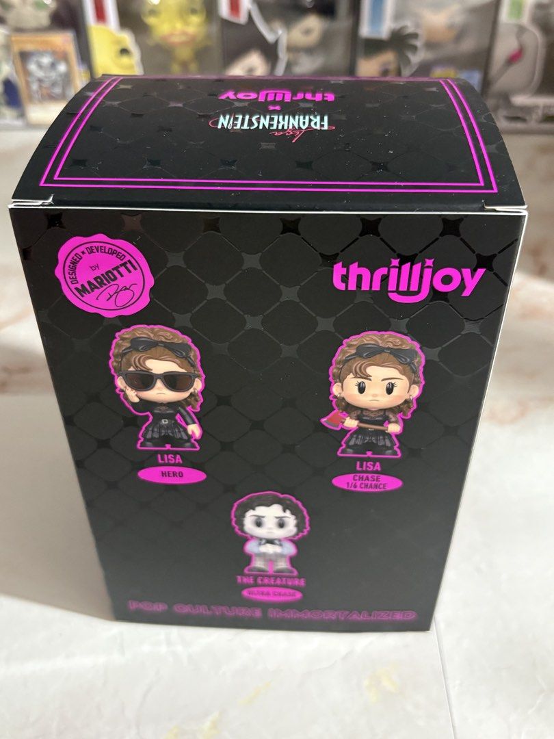 Thrilljoy Lisa Frankenstein x Thrilljoy PIX! Figure (Category: Designer & Blind Box Toys) located in Manila. Submitted by 120collectiblesbyrjtt (Listing ID 1453423385, Image 2). Description: - Lisa Frankenstein x Thrilljoy PIX! figure - Comes in original box - Box features a cool black and pink design - A unique collectible item.