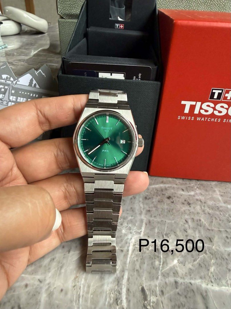 Tissot PRX Green Dial Watch (Category: Luxury Watches) located in Quezon City. Submitted by rhonadc (Listing ID 1453248923, Image 1). Description: - Tissot PRX Watch - Beautiful Green Dial - Stainless Steel Bracelet - Original Box Included - Warranty Card Included - Versatile for everyday or special occasions - Price is negotiable.