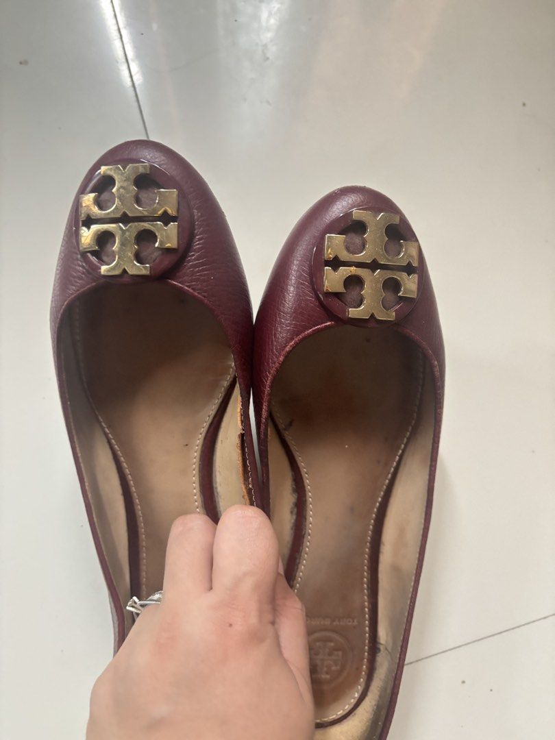 Tory Burch Burgundy Leather Ballet Flats (Category: Flats & Sandals) located in Cabanatuan. Submitted by ligen_dl (Listing ID 1453242314, Image 1). Description: - Burgundy leather Tory Burch ballet flats - Features classic gold Tory Burch logo on the toe - Slip-on style for easy wear - Soles show some signs of wear - Insoles have some marks - Ideal for everyday use.