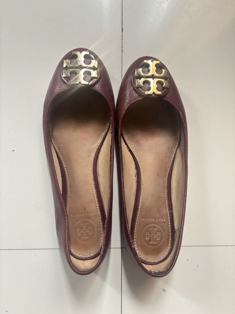 Tory Burch Burgundy Leather Ballet Flats (Category: Flats & Sandals) located in Cabanatuan. Submitted by ligen_dl (Listing ID 1453242314, Image 2). Description: - Burgundy leather Tory Burch ballet flats - Features classic gold Tory Burch logo on the toe - Slip-on style for easy wear - Soles show some signs of wear - Insoles have some marks - Ideal for everyday use.