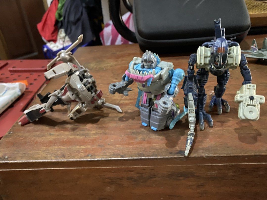 Transformers Cybertron Defense Minicons Lot (Category: Action & Battle Toys) located in Marikina City. Submitted by jtv17 (Listing ID 1453350884, Image 2). Description: Lot of 3 Transformers Cybertron Defense Minicons: helicopter, creature, robot. All transformable..