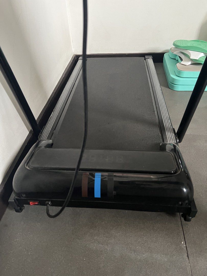 Treadmill upto 10 speed with Remote Control (Category: Cardio & Fitness Machines) located in Makati City. Submitted by kt1219 (Listing ID 1453275798, Image 2). Description: - 3.5HP Motor Power - Speed Range: 1 to 10 KM/H - Includes Remote Control and unused phone stand - Ideal for Home Workouts - Used less than 5x RFS: upgraded treadmill.