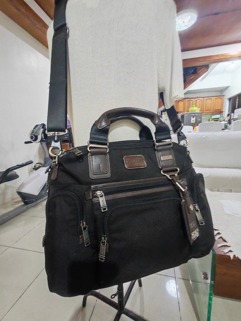 Tumi Alpha Bravo Brooks Briefcase (Category: Luxury Bags & Wallets) located in Iloilo. Submitted by blancroger_tumi (Listing ID 1453350041, Image 1). Description: - Tumi Alpha Bravo Brooks briefcase - Elegant brown leather accents - Spacious main compartment for ample storage - Multiple interior pockets for excellent organization - Includes a detachable shoulder strap for versatile carrying - Durable construction, ideal for work or travel - All z