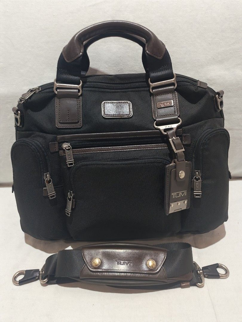 Tumi Alpha Bravo Brooks Briefcase (Category: Luxury Bags & Wallets) located in Iloilo. Submitted by blancroger_tumi (Listing ID 1453350041, Image 2). Description: - Tumi Alpha Bravo Brooks briefcase - Elegant brown leather accents - Spacious main compartment for ample storage - Multiple interior pockets for excellent organization - Includes a detachable shoulder strap for versatile carrying - Durable construction, ideal for work or travel - All z