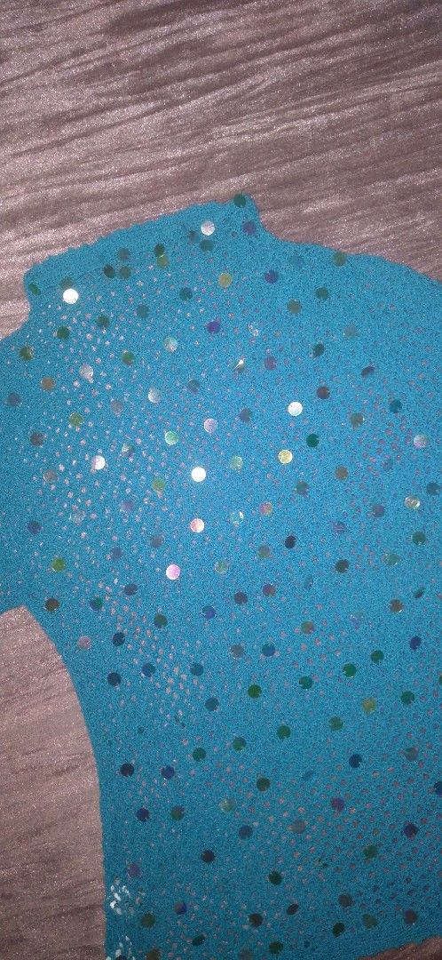 ( SOLD) 💙 Turquoise Sequin Knitted Top (Category: Sleeveless) located in Iloilo. Submitted by ukayedthis (Listing ID 1453349748, Image 2). Description: - Eye-catching turquoise mesh top - Covered in shiny sequins for a sparkly look - Ideal for parties, festivals, or any - Made with lightweight and breathable material - extra small to small only - Features a unique and standout design.