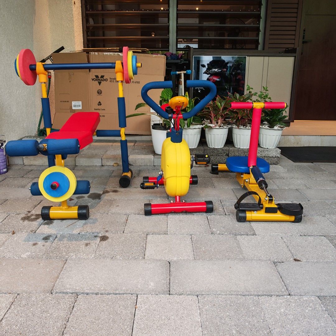 Toddler Home Gym Set (Category: Cardio & Fitness Machines) located in Manila. Submitted by declutterauntie (Listing ID 1453248603, Image 1). Description: - Toddler Home Gym Set - Includes: Weight bench with barbell holders, Yellow exercise bike, Rowing machine - Sturdy and colorful construction - Fun and delightful home kids workouts.