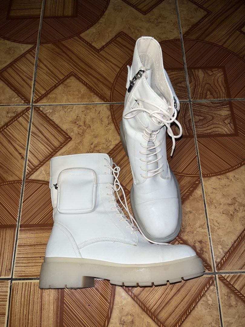 White Combat Boots with Pocket Detail (Category: Boots) located in Manila. Submitted by lavander0511 (Listing ID 1453420197, Image 1). Description: Bought in germany originally price almost 3k - White combat boots - Side pocket detail - Lace-up front - Side zipper for easy on/off - Chunky translucent sole - Ideal for a unique streetwear look.