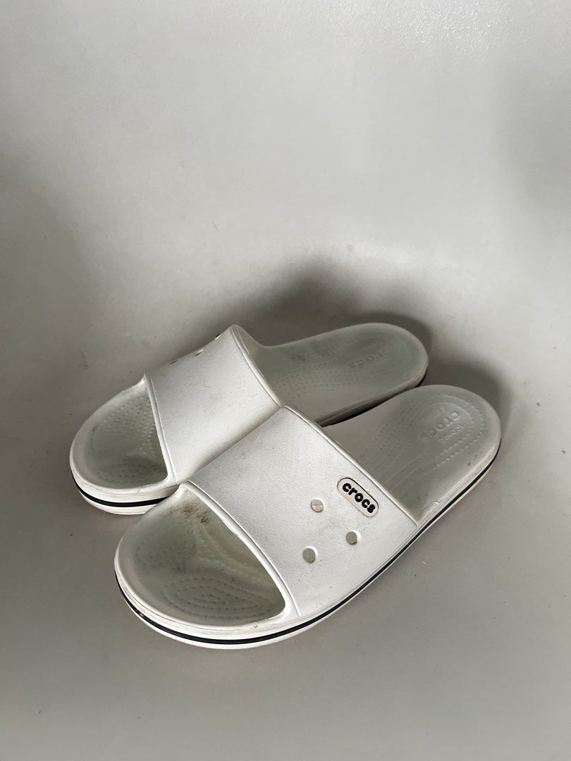 White Crocs Slides (Category: Slippers and slides) located in Manila. Submitted by bosetph (Listing ID 1453337754, Image 1). Description: Size 7 23.5 cm .