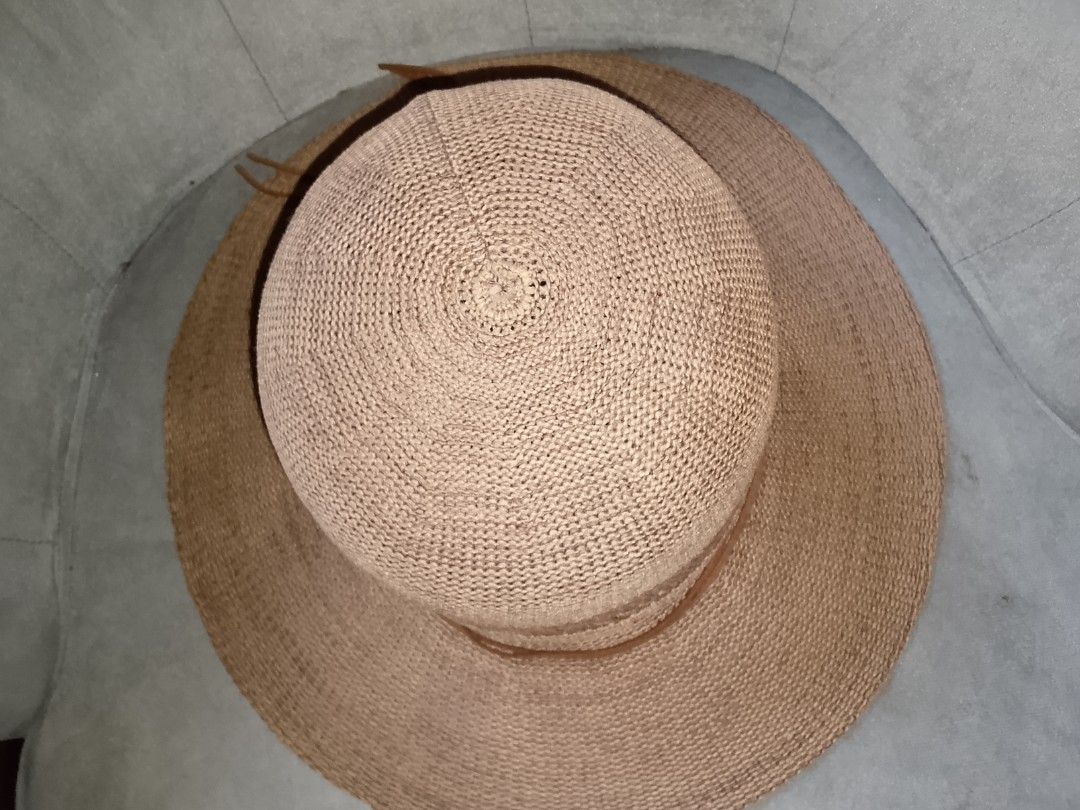 Woven Sun Hat with Leather Strap Detail (Category: Hats & Beanies) located in Binangonan. Submitted by yuristalin888 (Listing ID 1453325806, Image 2). Description: - Light brown woven sun hat - Wide brim for excellent sun protection - Braided texture for a stylish look - Decorative leather strap around the crown - Leather strings for adjustable tie closure - Ideal for beach trips and everyday casual outings.