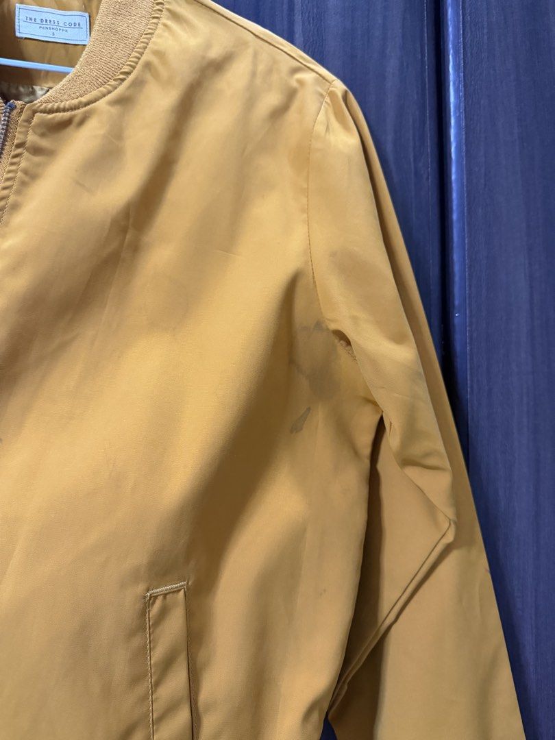 Yellow Bomber Jacket (Category: Coats, Jackets and Outerwear) located in Caloocan City. Submitted by iceyyy_21 (Listing ID 1453423292, Image 2). Description: - Yellow bomber jacket - Brand: penshoppe The Dress Code - Size: S - Features: Ribbed collar, cuffs, and hem; Zip-up front; Pockets - Style: Perfect for layering - Condition: Has some faint marks on the front (please check photos).