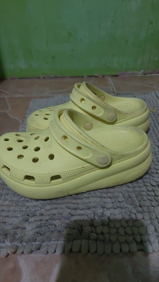 Yellow Crocs Clogs Sandals (Category: Babies & Kids Fashion) located in Marikina City. Submitted by adrianakendall88 (Listing ID 1453311306, Image 1). Description: - Classic yellow Crocs clogs - Features ventilation holes for breathability - Easy slip-on, slip-off design - Ideal for casual outings or gardening - Comfortable and durable construction - Size C13. Original price 2750php.