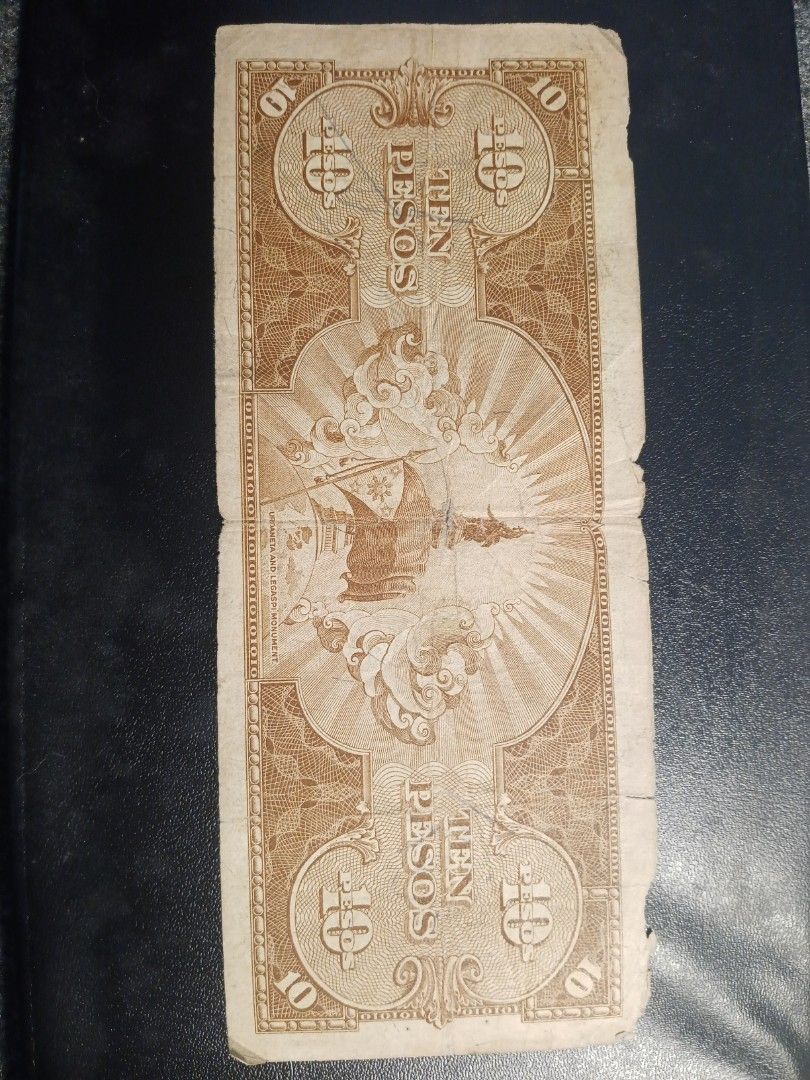 1949 Philippine 10 peso bill (Category: Currency) located in Baguio. Submitted by pepper.sau53shoe (Listing ID 1456773196, Image 2). Description: A 1949 Philippine Ten Pesos banknote from the English Series, featuring the Gomburza (Fathers Mariano Gomez, Jose Burgos, and Jacinto Zamora) vignette on the face Issuing Authority: Central Bank of the Philippines (established 1949)Signatures: Appears to bear the signatures of President Elpidio Quirino 