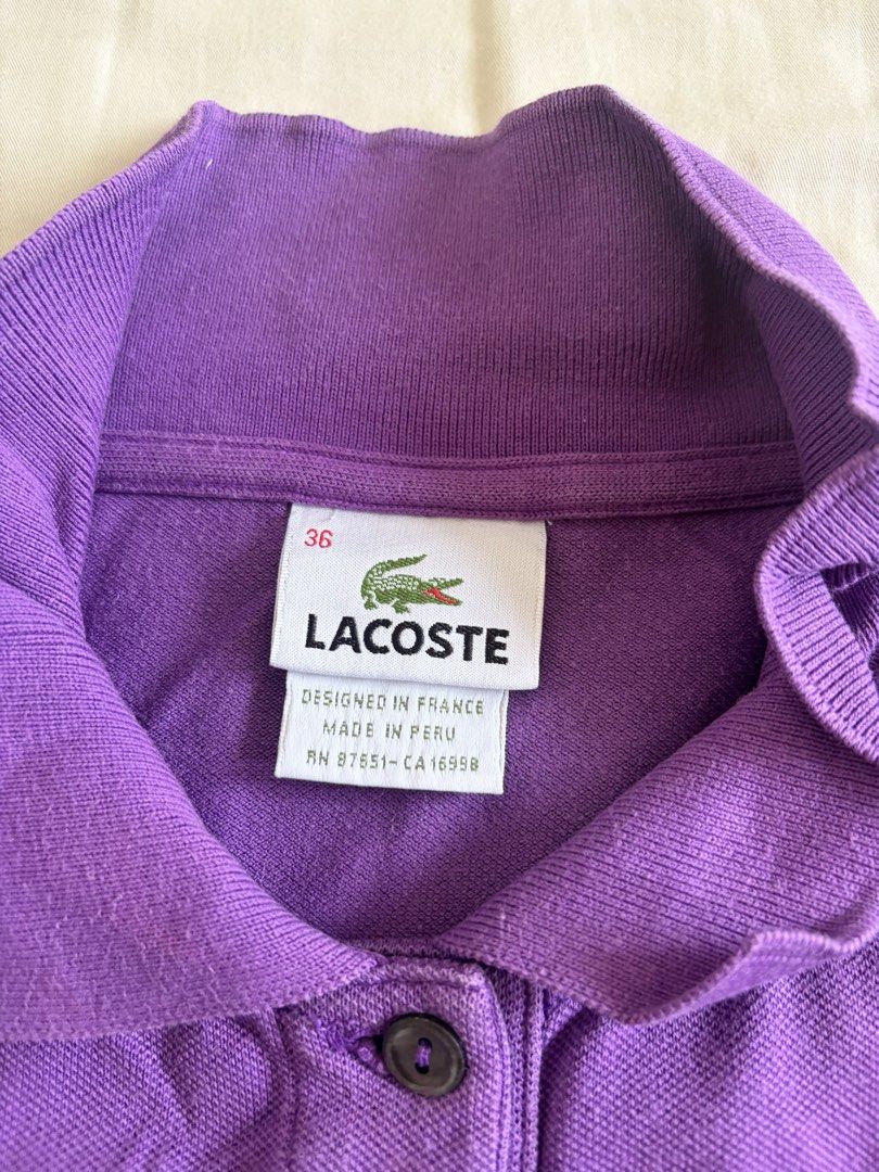 2pcs Lacoste Polo (Category: Shirts) located in Makati City. Submitted by v_nav (Listing ID 1456622921, Image 2). Description: Violet and pink. Size 36 (fits small) Has small almost unnoticeable stains due to laundry. Otherwise wearable and a good deal.