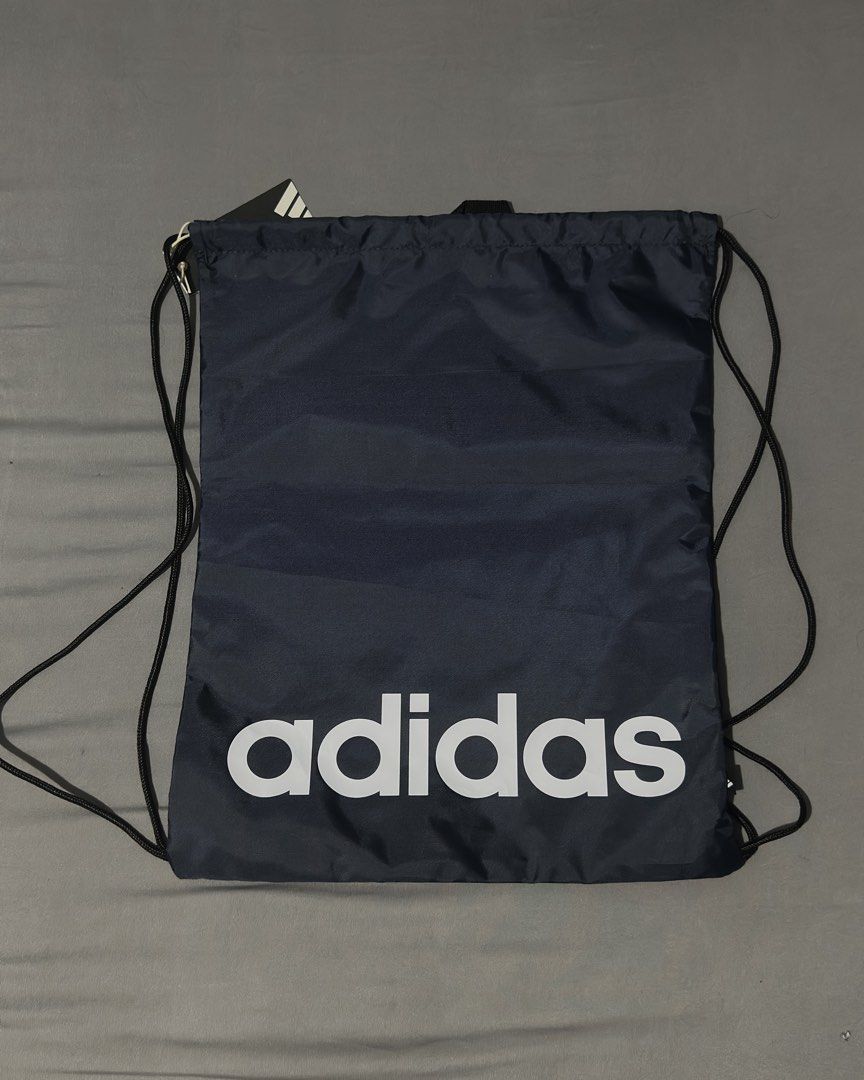 Adidas Drawstring Bag Navy Blue (Category: Backpacks) located in Iloilo. Submitted by deangalaxc (Listing ID 1456750811, Image 1). Description: -original -brand new with tag.