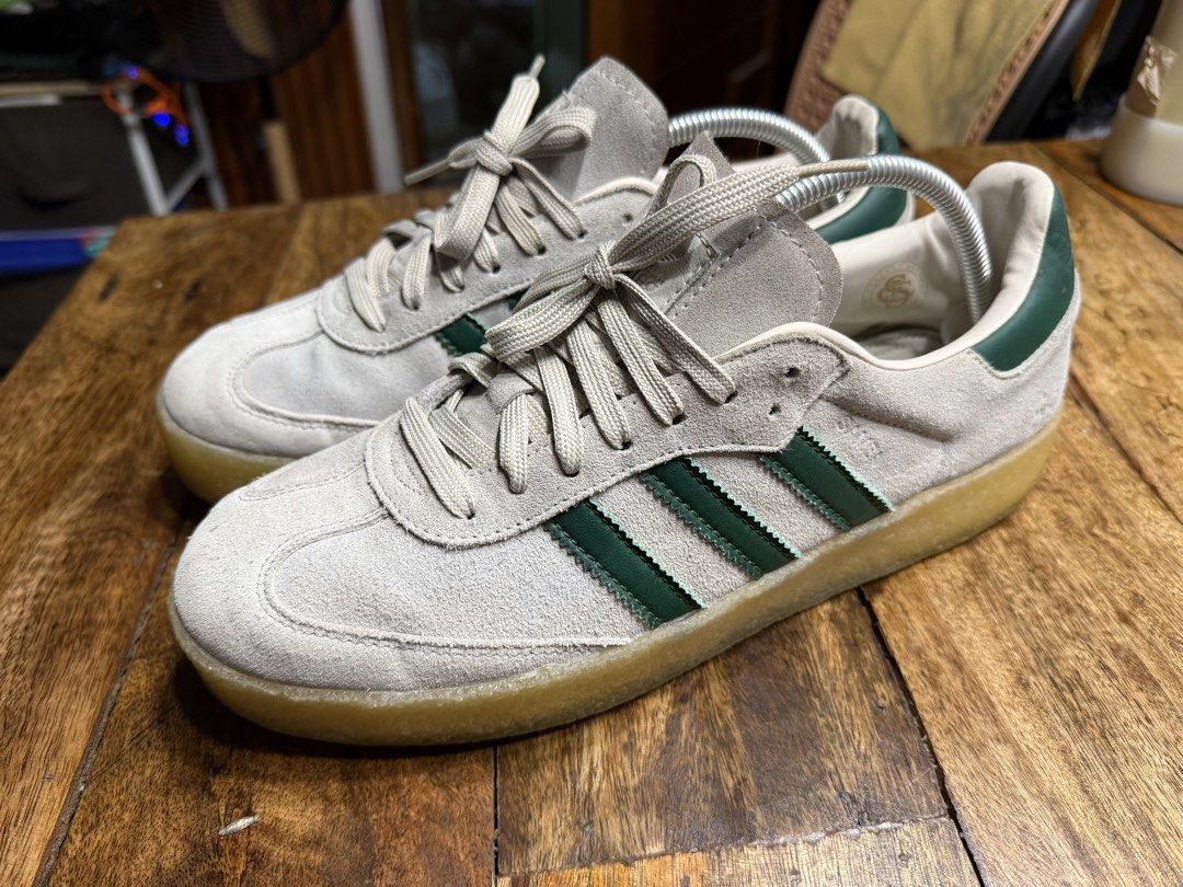 Adidas Samba x Kith (Category: Sneakers) located in Manila. Submitted by safeowl.b6dbb0 (Listing ID 1456712497, Image 1). Description: - Classic Adidas Samba OG sneakers - Grey suede upper with iconic green stripes and heel tab - Durable gum sole for a retro aesthetic - Shoe trees included to preserve shape - Ideal for everyday casual wear or achieving a vintage look - A must-have for any sneaker enthusiast's collection.