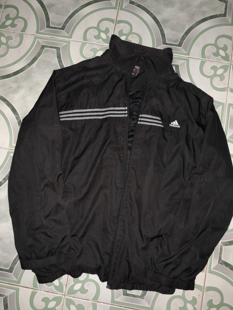 Adidas Track Jacket with 3 Stripes (Category: Coats, Jackets and Outerwear) located in La Trinidad. Submitted by lerhye (Listing ID 1456645094, Image 2). Description: - Don't expect brand new quality; lighting may affect how the item looks in photos. - Issue: No zipper.