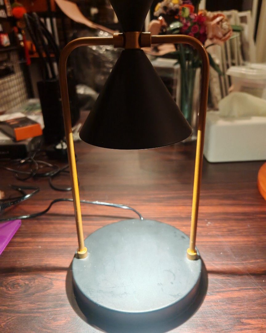Adjustable Desk Lamp with Timer Function (Category: Lighting) located in Singapore. Submitted by homeisgold (Listing ID 1456732495, Image 2). Description: - Black cone shade lamp - Gold metal frame - Circular base - Adjustable light intensity - Power, timer, and intensity buttons - Cord included - Ideal for desk or bedside table.