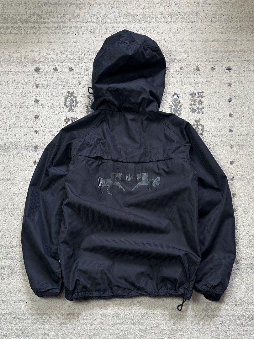 Amazon Rain Shell chrome Jacket (Category: Coats, Jackets and Outerwear) located in Daet. Submitted by thrifthings2018 (Listing ID 1456618870, Image 2). Description: - Black Amazon rain shell jacket - Hooded with drawstring hem - Unique horse graphic on the back - Lightweight and practical for rainy weather - Measurements: Width 20.5 inches, Length 26 inches.
