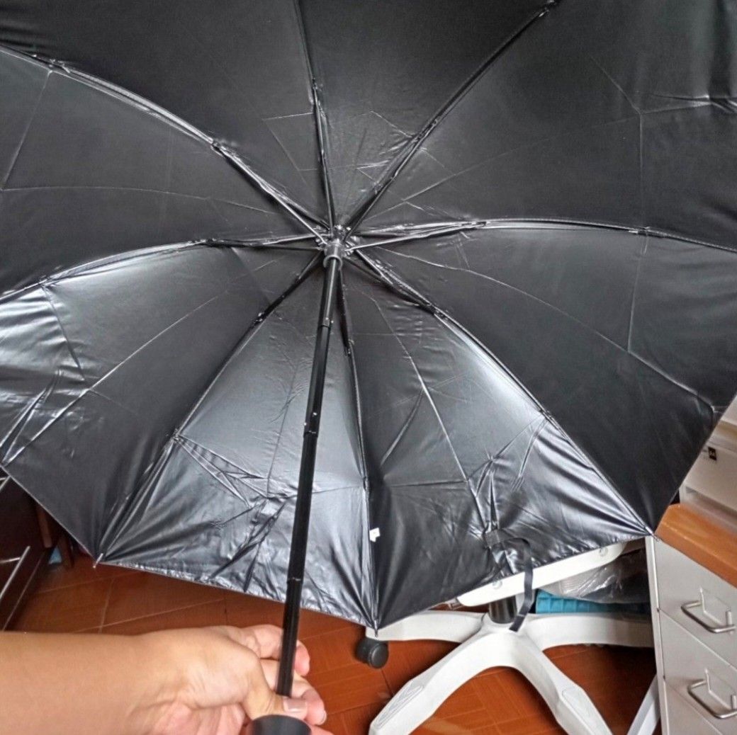Automatic Foldable Umbrella - sold each (Category: Umbrellas) located in Quezon City. Submitted by an.marie (Listing ID 1421976200, Image 3). Description: Compact foldable umbrella. Easy to carry, with a black handle, button, and wrist strap. Comes in clear plastic packaging..