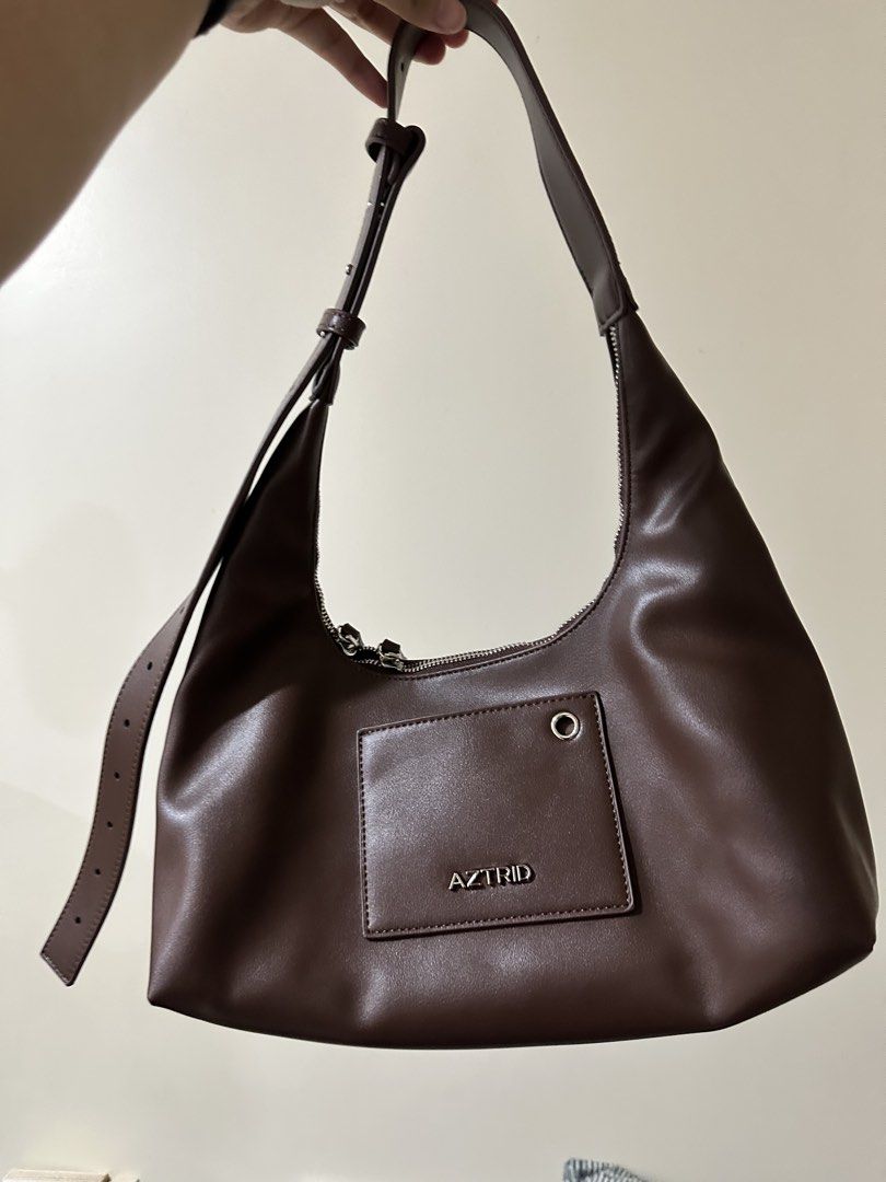 Aztrid Crossbody bag small - Dark Brown (Category: Cross-body Bags) located in Taguig. Submitted by mandms09 (Listing ID 1456735758, Image 2). Description: No rush pls! Still with box and dust bag RFS: size is to close to something I already own Bought for ₱1,149 Price negotiable.