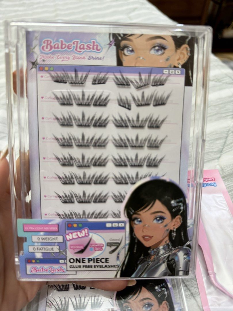 BabeLash Glue-Free Eyelashes with Applicator (Category: Makeup) located in Quezon City. Submitted by m3gan8 (Listing ID 1456727017, Image 2). Description: - 2 Packs of BabeLash Glue-Free Eyelashes - Ultra-light air fiber for zero weight & no fatigue - Easy to apply and remove - Includes a pink lash applicator tool - Ideal for a quick and effortless lash upgrade.