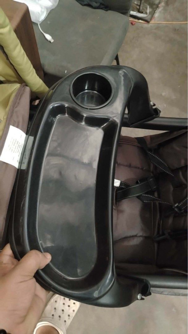 Baby Trend Sit-N-Stand Plus Double Stroller (Category: Strollers) located in Calamba. Submitted by rhiajapansurplus-babystuff-03 (Listing ID 1456606165, Image 3). Description: - Sit-N-Stand Plus stroller - perfect for two kids! - Versatile: Front seat for one, rear platform for another to stand. - Stylish brown and tan color scheme. - Convenient cup holder tray. - Spacious storage basket underneath. - Easy to maneuver for smooth rides. - Ideal fo