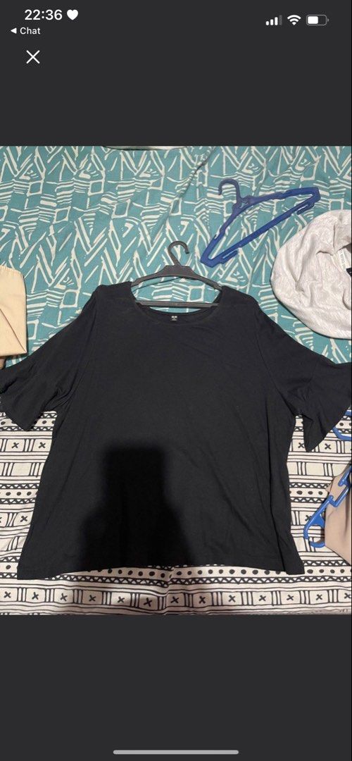 Black Flutter Sleeve Top (Category: Blouses) located in Quezon City. Submitted by rish40 (Listing ID 1456740743, Image 1). Description: - Chic black top - Soft and flowy fabric - Features elegant flutter sleeves - Round neckline - Versatile for casual or dressed-up looks - Pairs well with jeans or skirts - Designed for comfort.