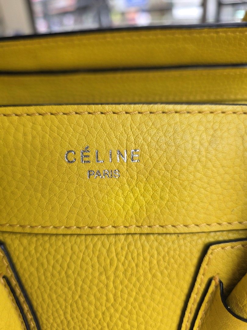 Celine Yellow Leather Handbag (Category: Luxury Bags & Wallets) located in Lemery. Submitted by venus23 (Listing ID 1456618237, Image 2). Description: - yellow Celine handbag - Crafted from textured leather - Convenient top handles - Zippered front pocket for easy access - Interior features a leather strap with the iconic Celine Paris logo - Ideal for everyday wear - Shows minor marks on the handle, adding character.